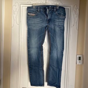 Mens Diesel Jeans, size 32, medium blue color, thavar style, slim and skinny